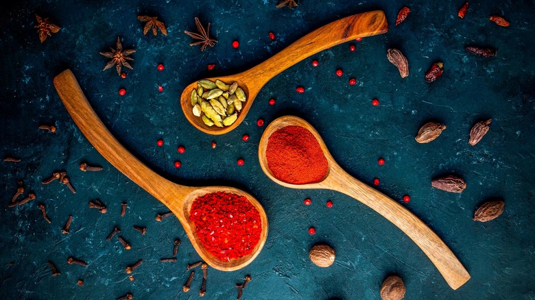 Three spoons holding spices