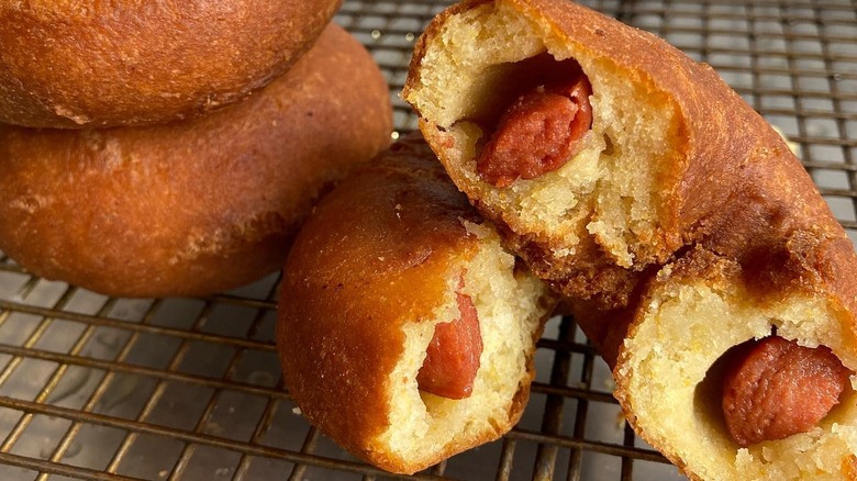 corn dog donuts on cooling rack