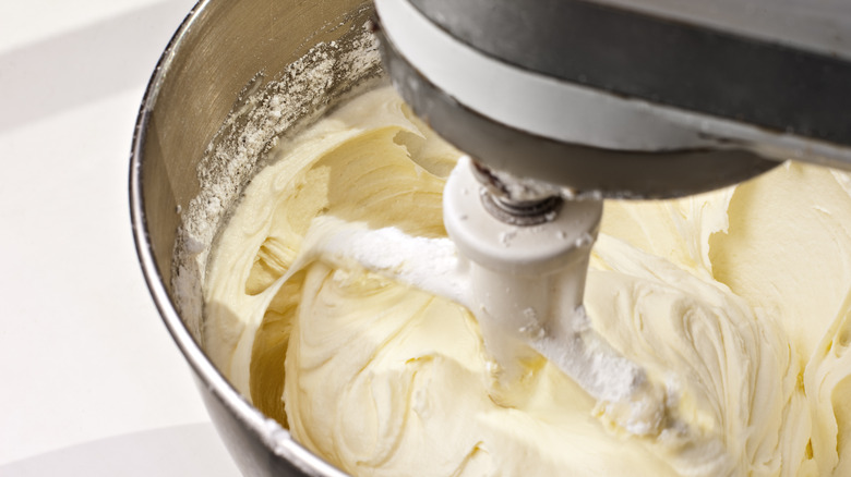 white buttercream in a mixer