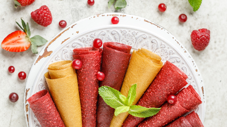 Variety of fruit leathers rolled up 