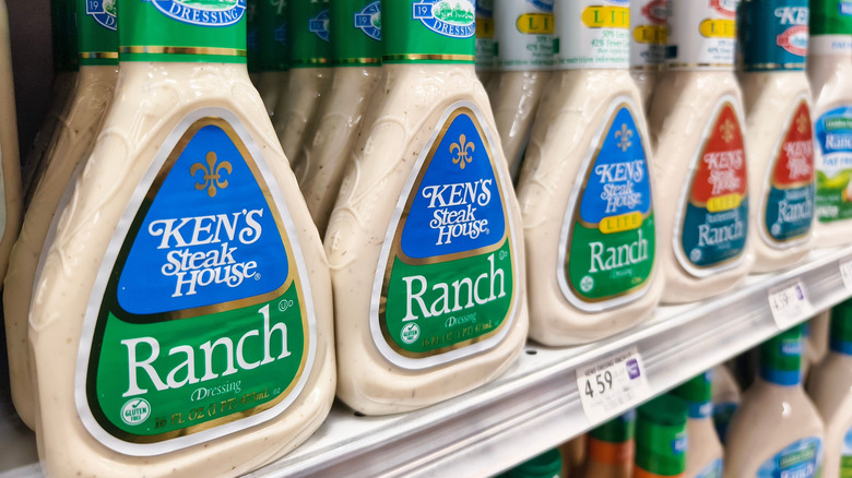 Row of Ken's brand ranch dressings on store shelf.