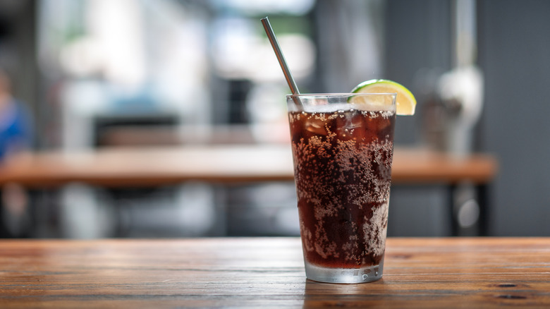 a glass of carbonated beverage