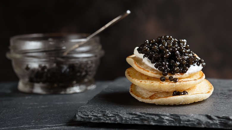 Caviar on stack of pancakes