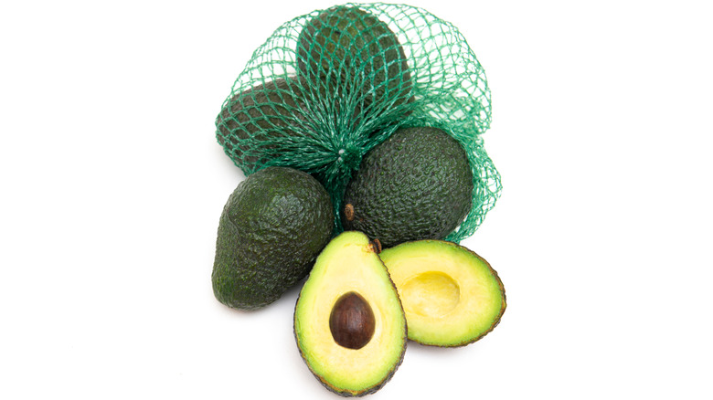 Avocados in mesh produce bag