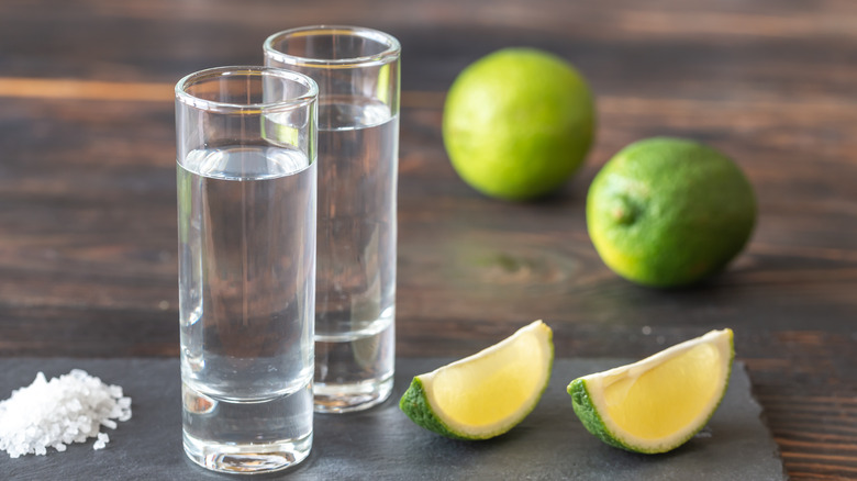 Silver tequila shots with lime