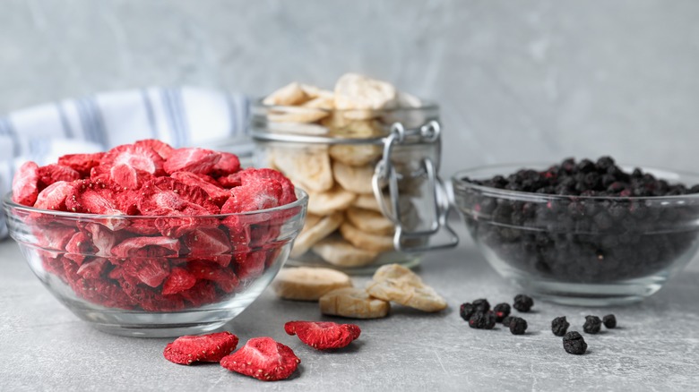 Various freeze-dried fruits in glass bowls