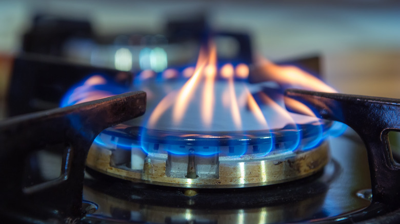 Blue flames on gas stove