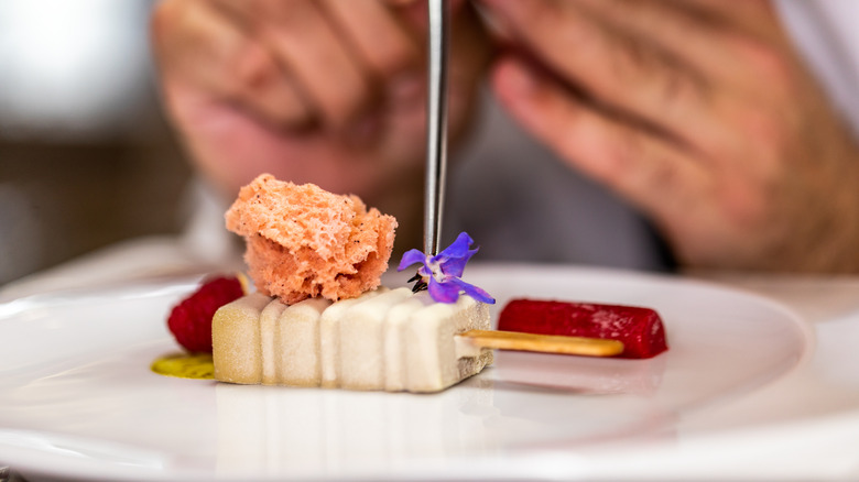 Chef plating lolly dessert