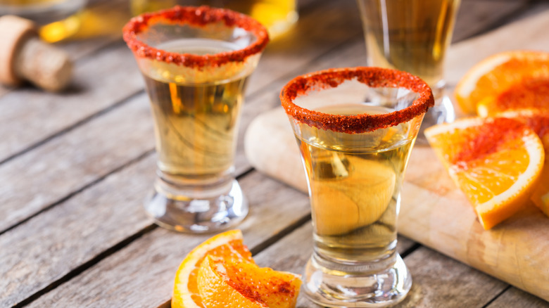 tequila shots with orange slices