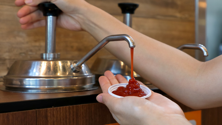 A fast food restaurant ketchup dispenser 