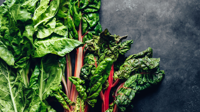 Salad greens on dark background