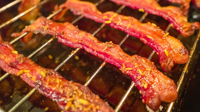 Bacon on a rack on cooking sheet