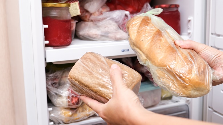 Bread being put in freezer