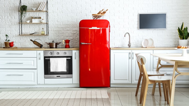 Kitchen with red refrigerator 