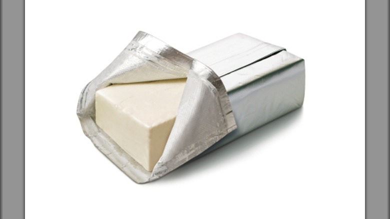 cream cheese block in foil wrapping