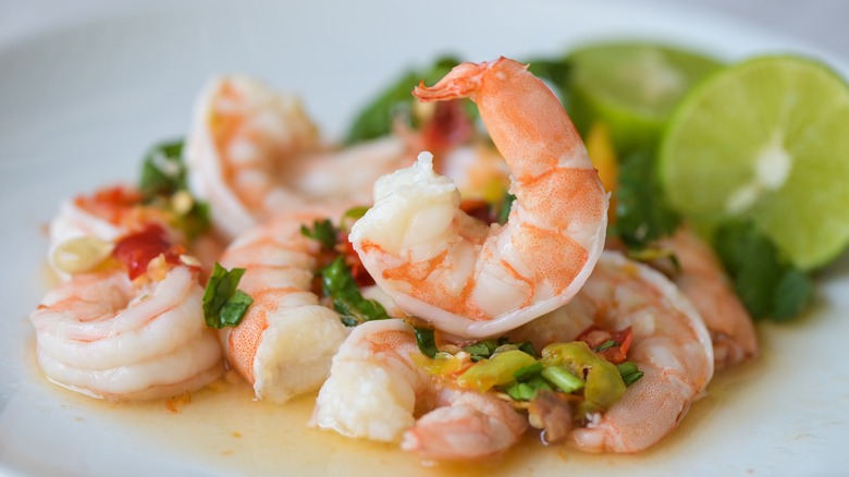 plate of shrimp with lime