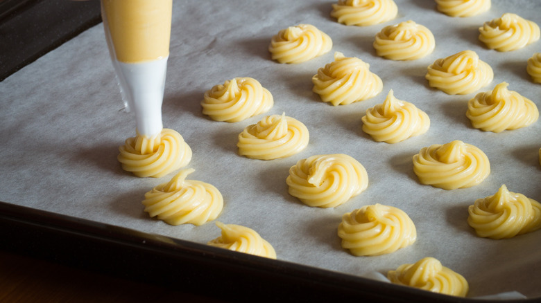 Piping choux pastry 