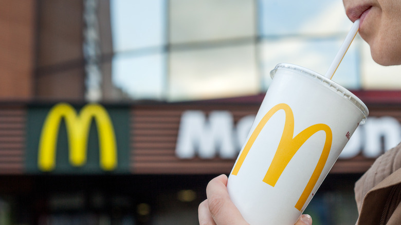 Person drinking McDonald's drink