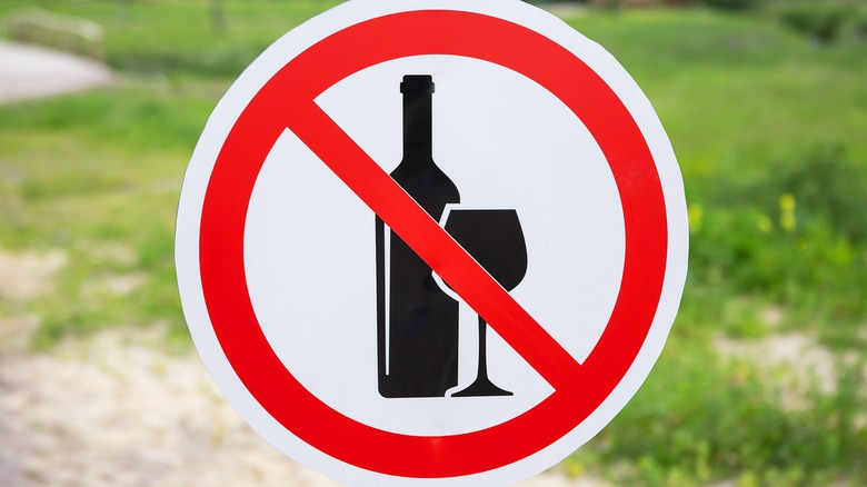 No alcohol sign on green grass