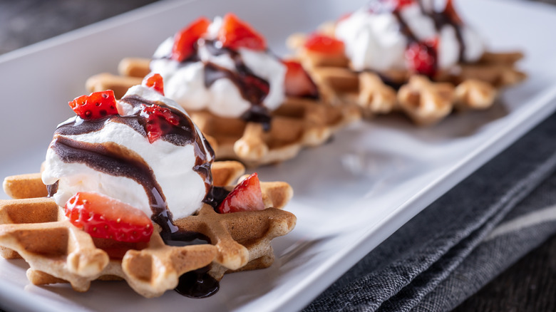 waffles with whipped cream and strawberries