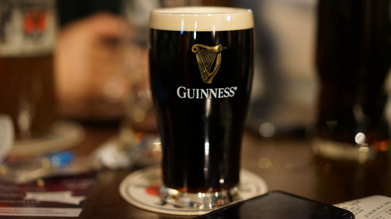 Pint of Guinness on bar table