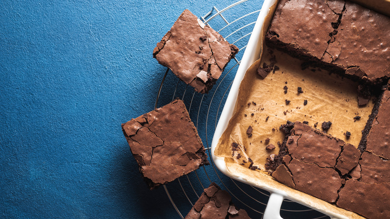 Brownies and pan on table