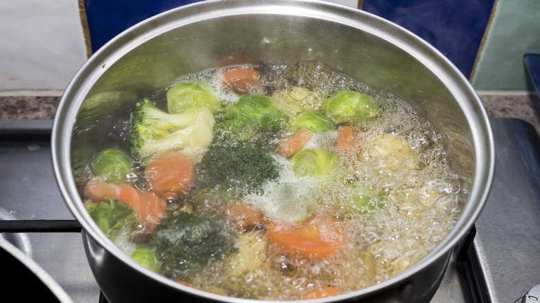 Vegetables boiling in a pot