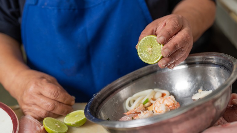 cook preparing ceviche