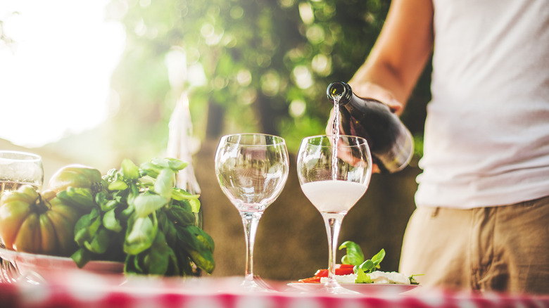 Man pouring prosecco