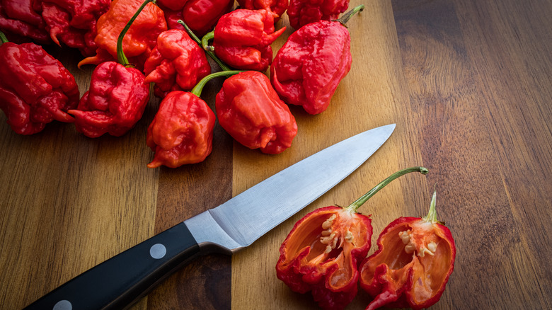 Carolina reaper pepper on cutting board