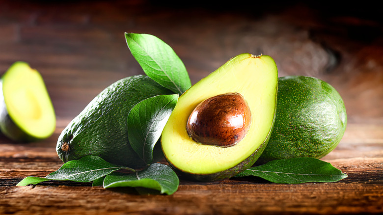 half a ripe avocado with two uncut