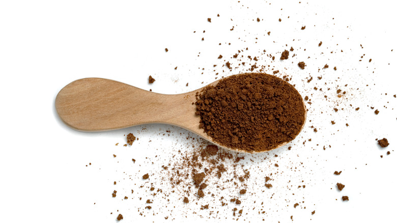 Instant coffee in a wooden spoon