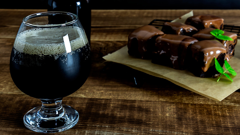 Dark beer and frosted brownies