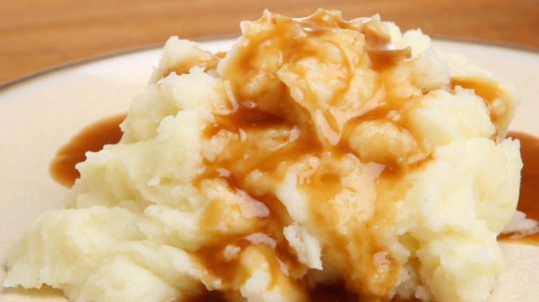 Mashed potatoes and gravy close up