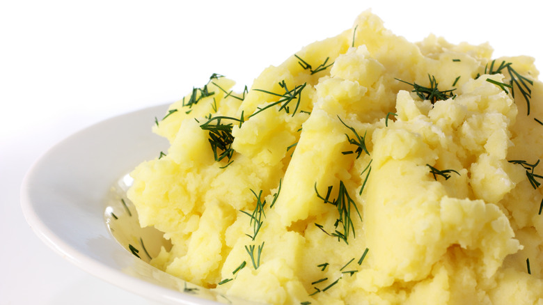 Herb topped mashed potatoes close up