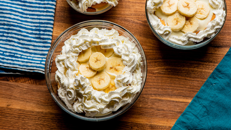 Banana pudding garnished with whipped cream