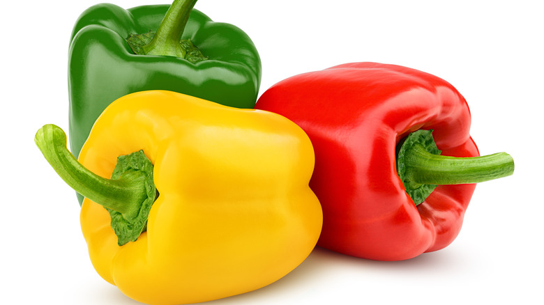 Green, red, and yellow bell peppers