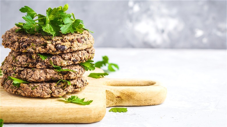 Stacked black bean patties with cilantro 