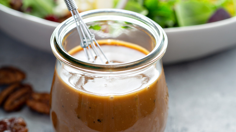 https://www.thedailymeal.com/img/gallery/the-secret-to-great-homemade-dressing-is-starting-with-your-jam-jar/this-dressing-is-the-jam-1680875002.jpg