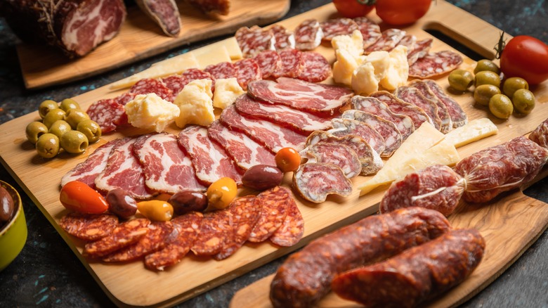 Charcuterie meats on wooden board