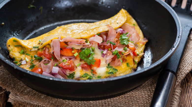 stuffed omelet in a skillet