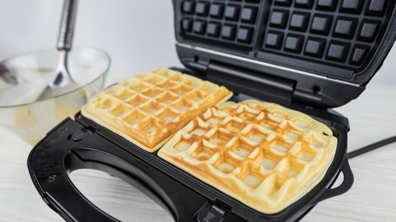 unevenly cooked waffles in iron