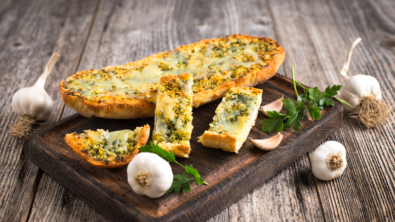 grilled garlic bread with garlic bulbs