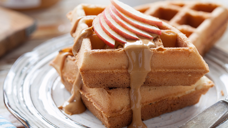 Waffles with peanut butter and apple slices