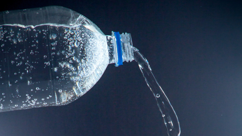 Seltzer being poured from bottle