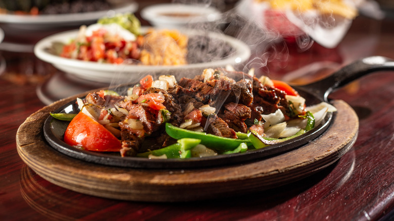 Steak fajitas in a skillet