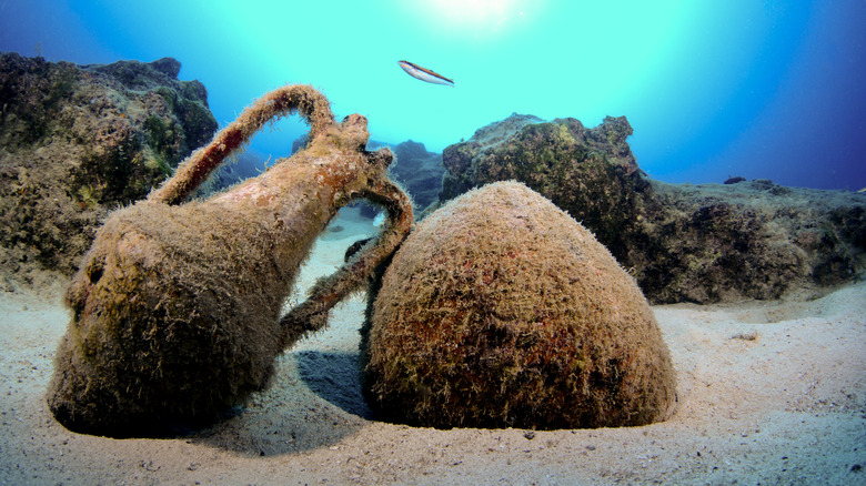 Amphoras sitting on ocean floor