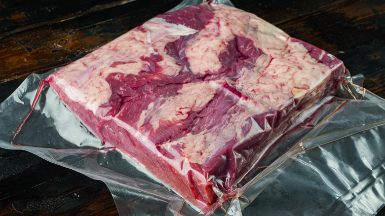 Beef in vacuum-sealed cryovac bag