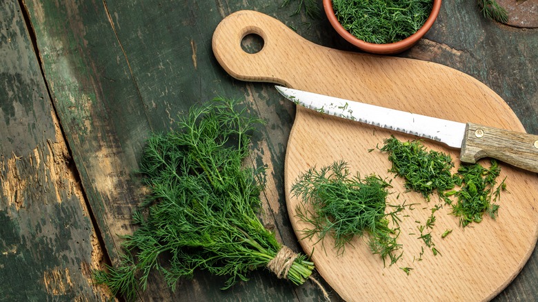 Chopped dill on cutting board