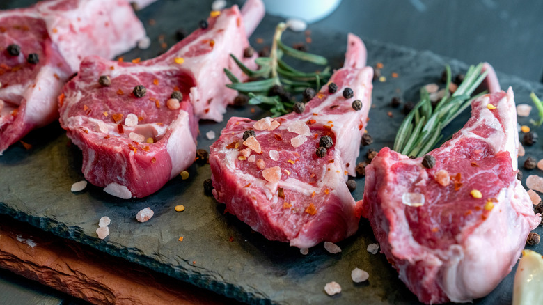 uncooked seasoned lamb chops